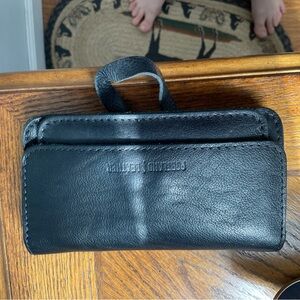 Portland leather clutch wallet with wrist strap black snaps pebbled leather